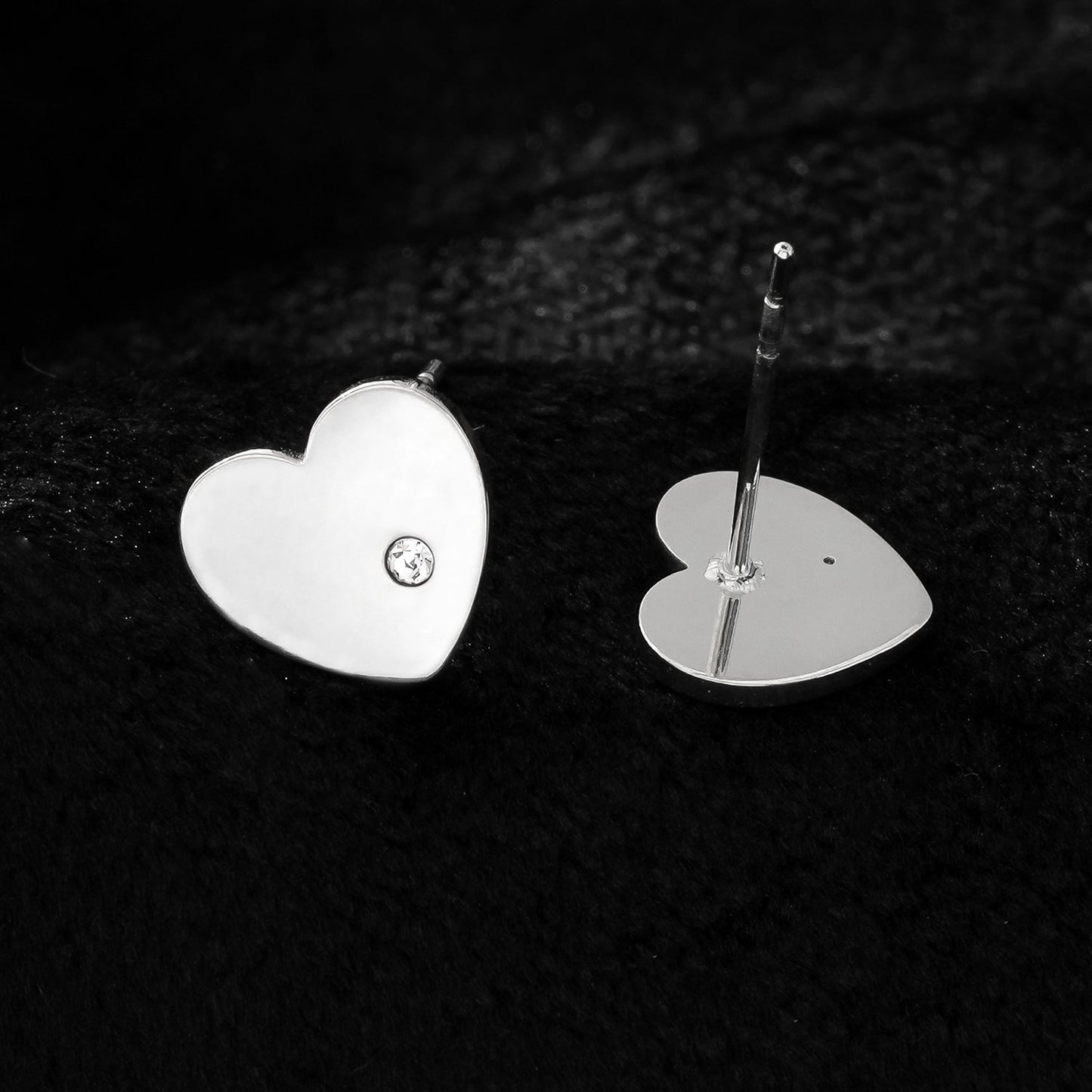 CUORE: Silver Toned White Gold Heart Shaped Solitaire Zirconia (CZ) Stud Earrings